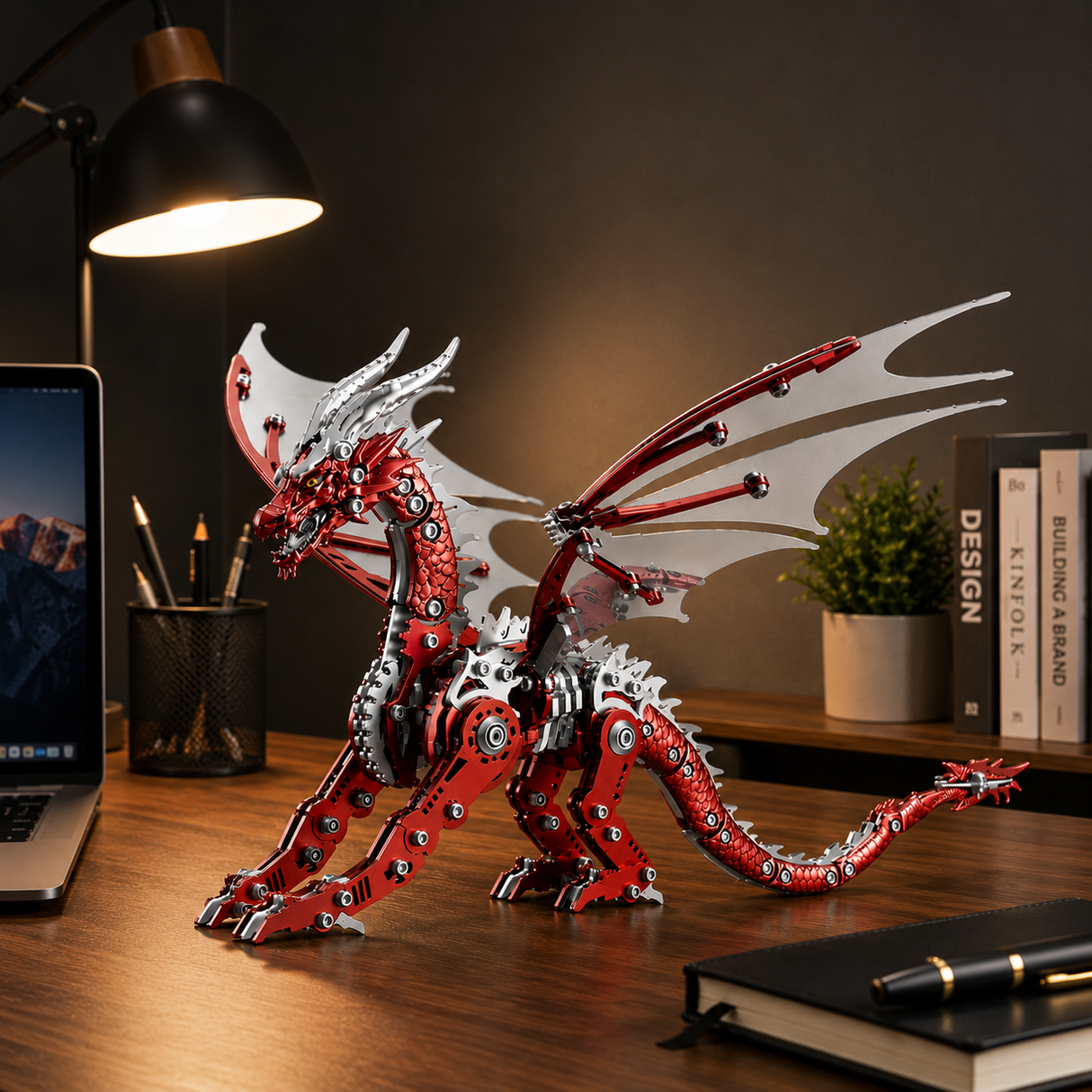 Mechanical winged dragon 3D metal model kit displayed on an office desk