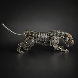 Articulated mechanical panther displayed in a hunting crouch