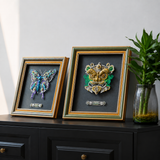 Completed mechanical butterfly 3D metal puzzle transformed into framed metal artwork