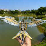 Finished Mechanical Falcon Predator metal model displayed outdoors, highlighting its detailed wing design.