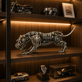 Mechanical panther metal sculpture displayed on a collector shelf