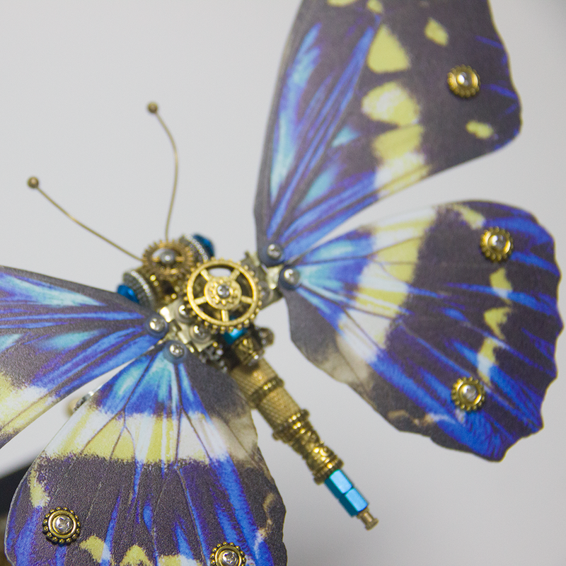 Laad de afbeelding in galerijviewer, Steampunk Goddess of Light Butterfly Mechanical Metal Puzzle Model with Music Box
