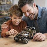 father and son building metal jeep model kit together